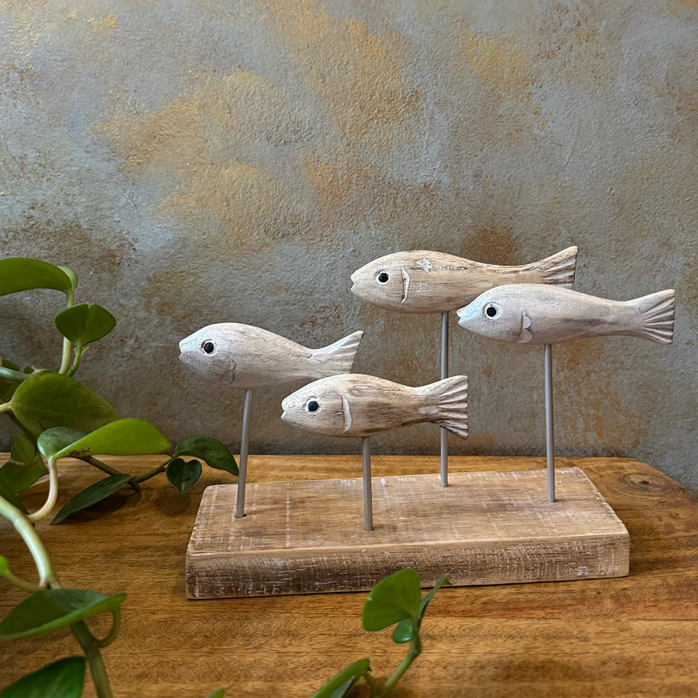 Wooden fish sculpture home decor with four carved fish on stand