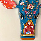 Decorative item with floral patterns on a beige background